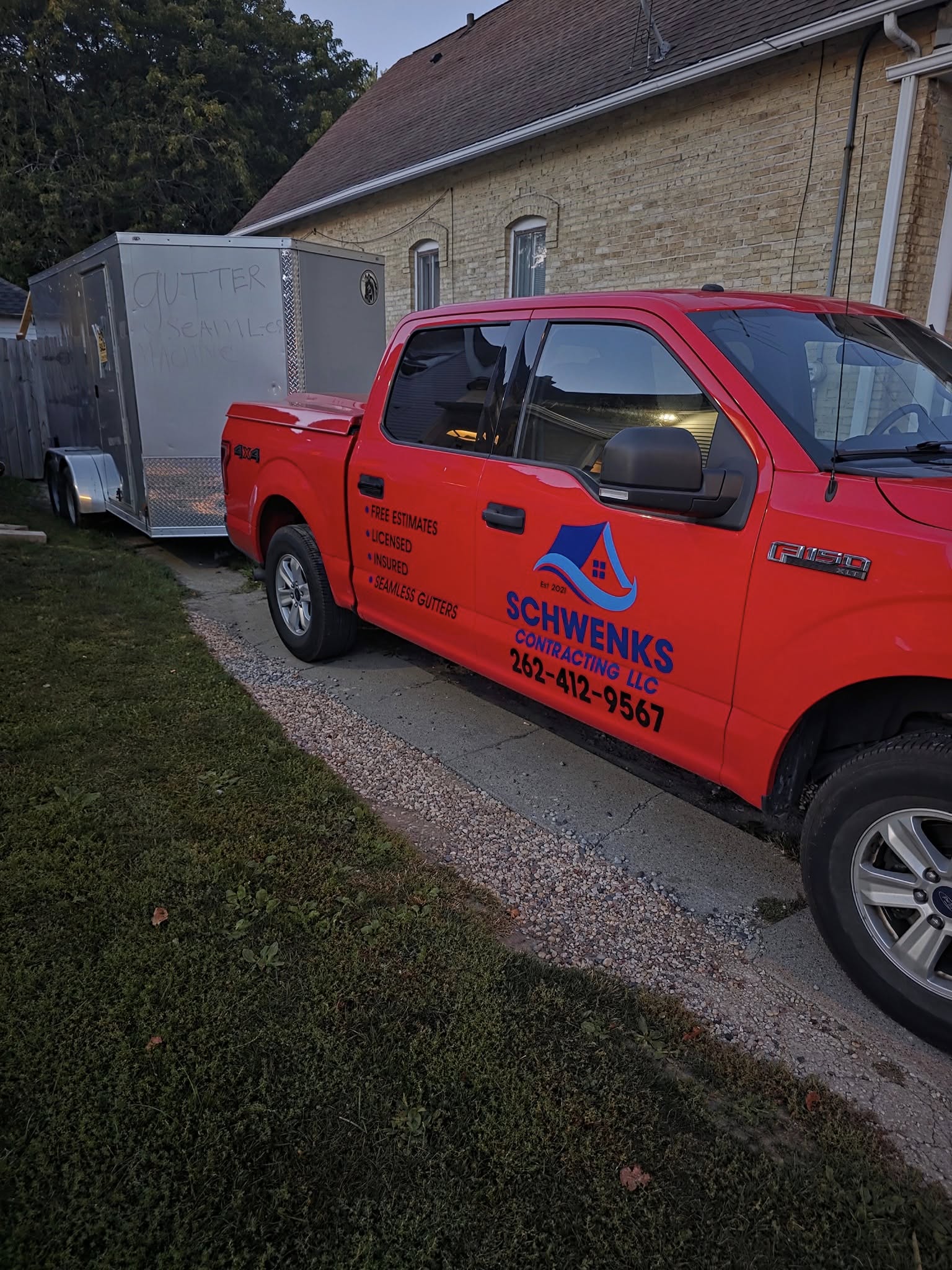 Schwenk's Contracting truck and enclosed trailer ready for a gutter job